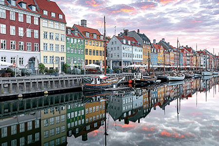 Colorful buildings and boats at Nyhavn canal, Copenhagen.
